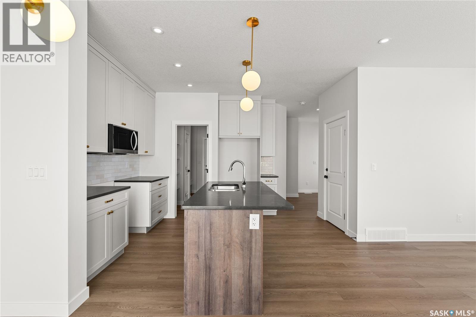 295 Nazarali Way, Saskatoon, Saskatchewan  S7V 1X6 - Photo 16 - SK029350