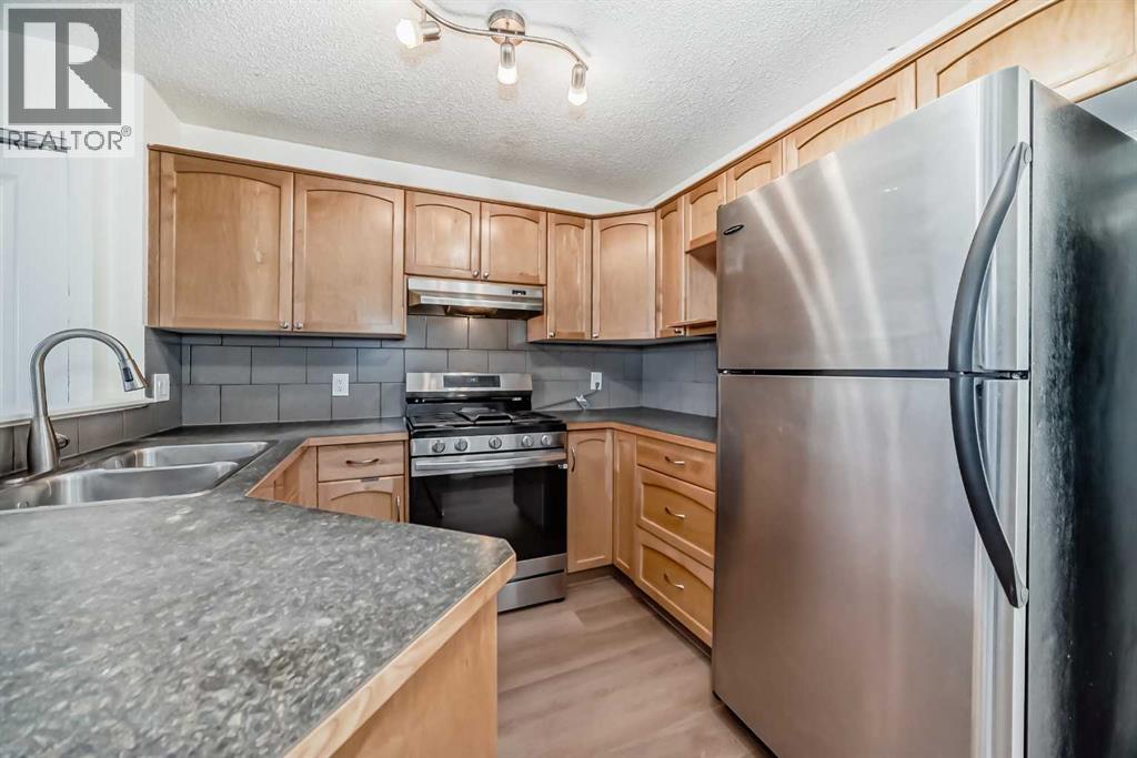 10 Bridlecrest Manor Sw, Calgary, Alberta  T2Y 4Y2 - Photo 8 - A2288418