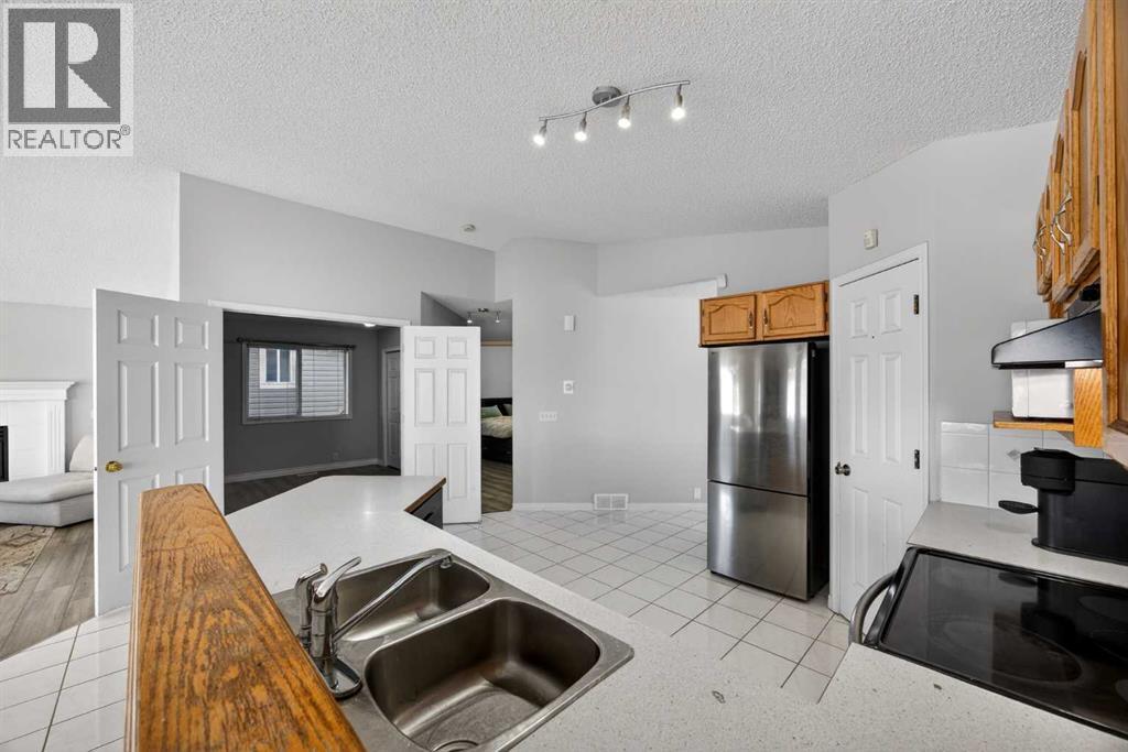 108 Harvest Creek Court Ne, Calgary, Alberta  T3K 4N8 - Photo 11 - A2289100