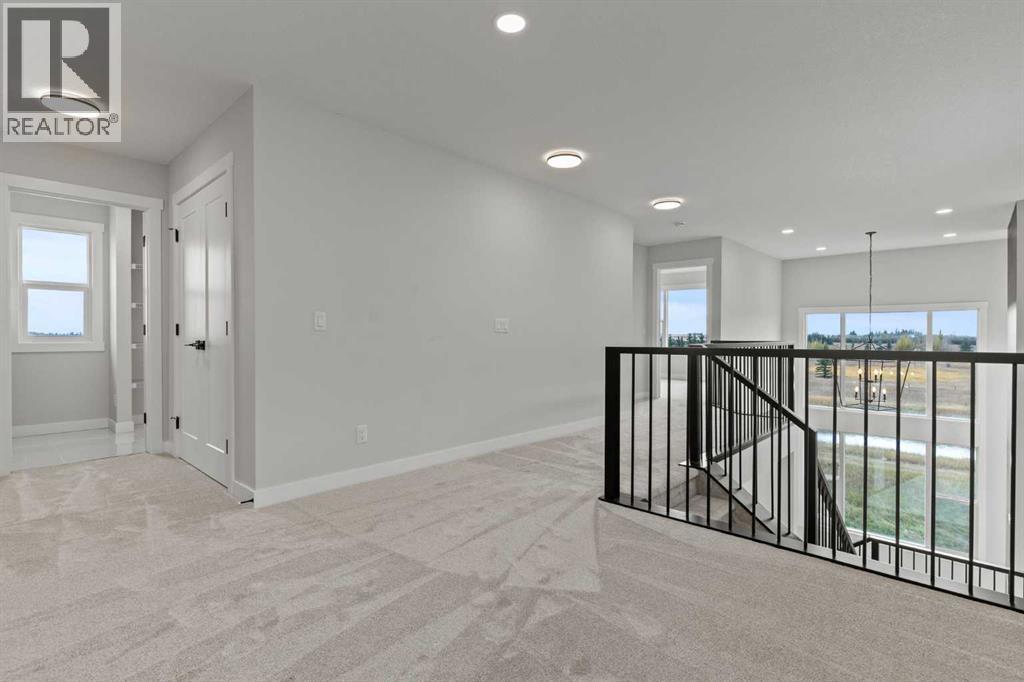 302 Kinniburgh Loop, Chestermere, Alberta  T1X 3C3 - Photo 21 - A2289506