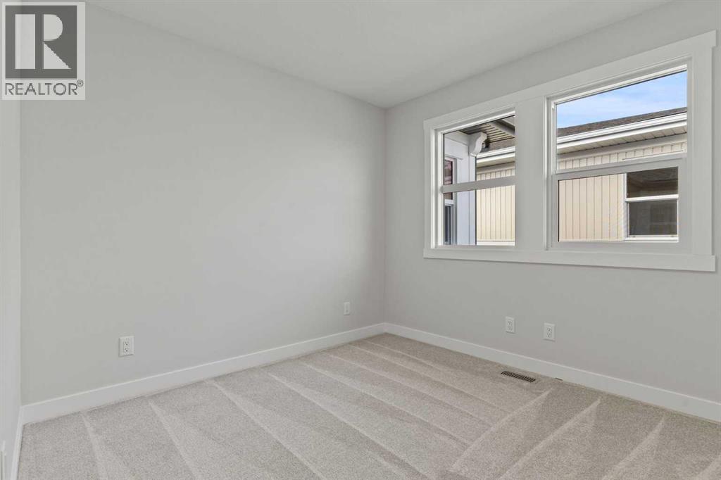 302 Kinniburgh Loop, Chestermere, Alberta  T1X 3C3 - Photo 34 - A2289506