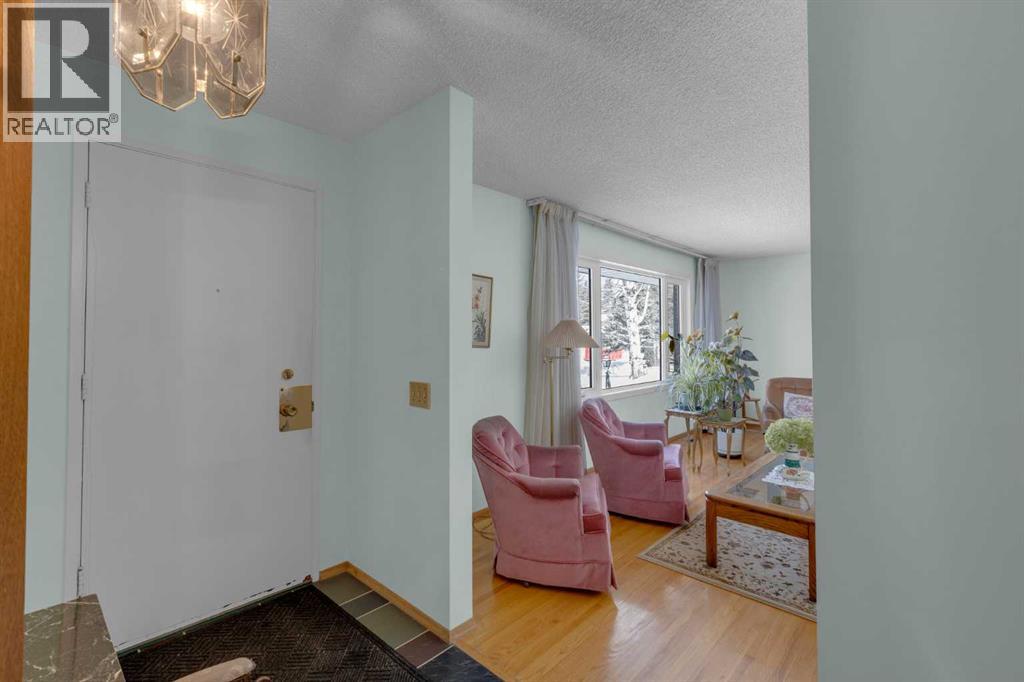 9628 Palisan Place Sw, Calgary, Alberta  T2V 3S9 - Photo 4 - A2287456