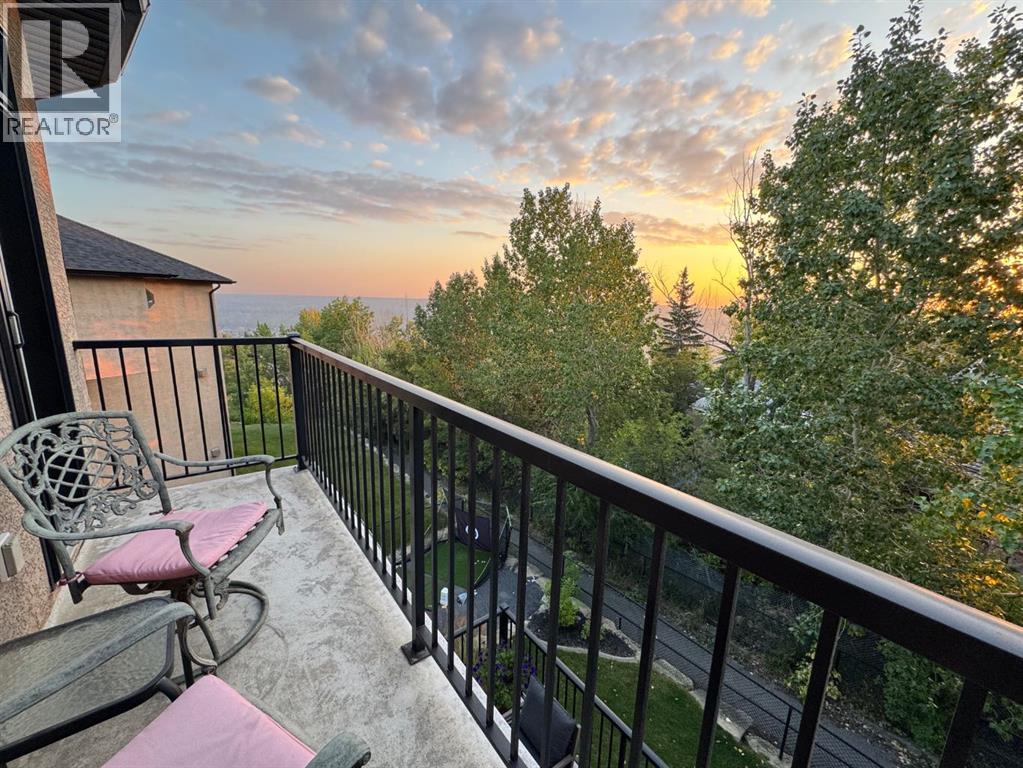 48 Coulee Park Sw, Calgary, Alberta  T3H 5J5 - Photo 25 - A2288022