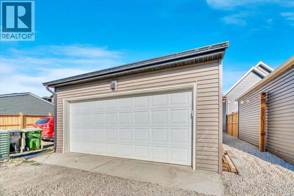 559 Wolf Creek Way Se, Calgary, Alberta  T2X 4Y9 - Photo 43 - A2289317