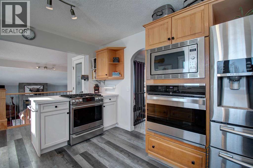 104 Hill Spring Meadows, Rural Rocky View County, Alberta  T4B 2A3 - Photo 16 - A2289131