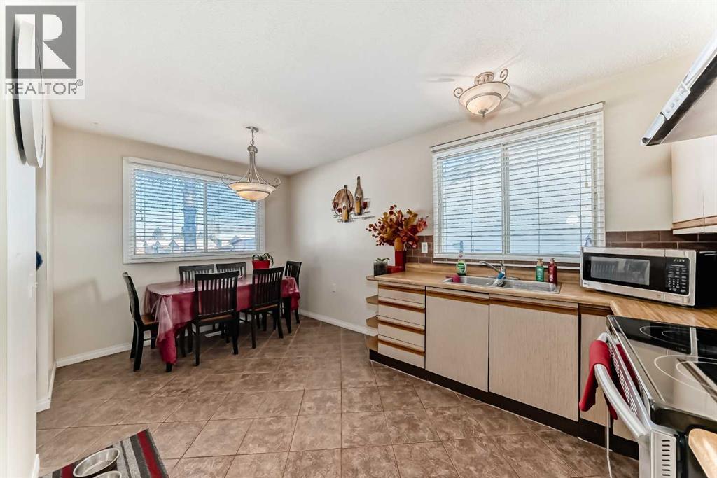 208 Bracewood Road Sw, Calgary, Alberta  T2W 3C1 - Photo 12 - A2280350