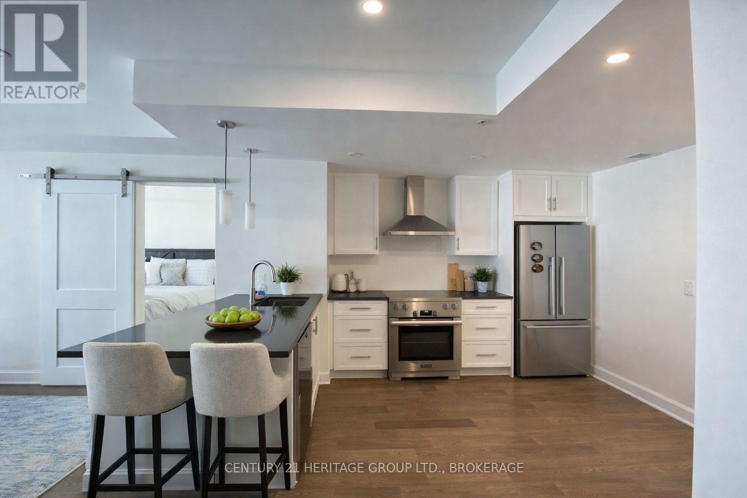 409 - 129 South Street, Gananoque, Ontario  K7G 1A1 - Photo 3 - X12827856