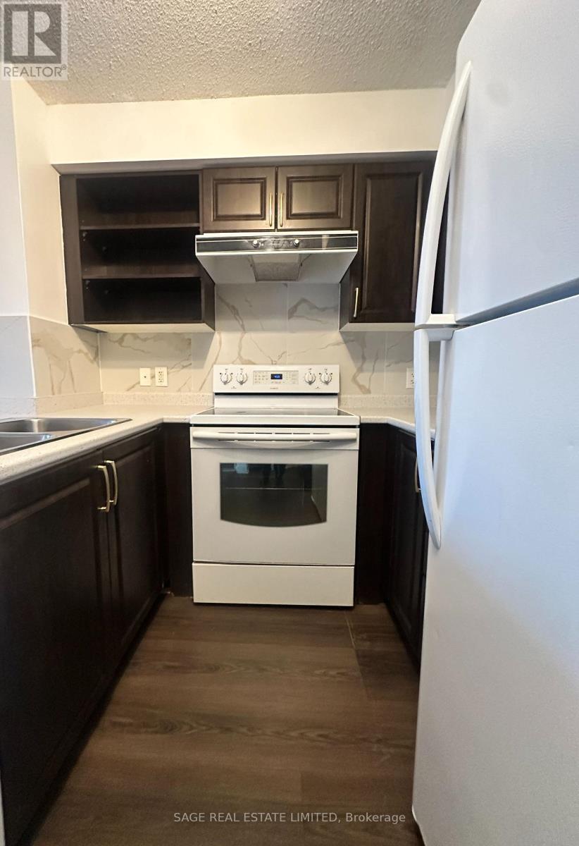 310 - 120 Dallimore Circle, Toronto, Ontario  M3C 4J1 - Photo 6 - C12824402