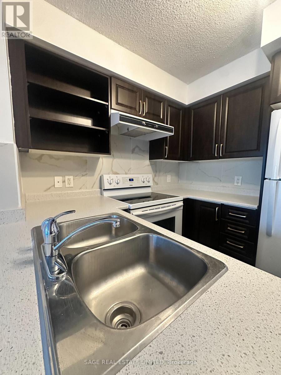 310 - 120 Dallimore Circle, Toronto, Ontario  M3C 4J1 - Photo 5 - C12824402