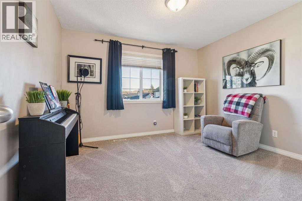 104 Bow Ridge Crescent, Cochrane, Alberta  T4C 1V2 - Photo 19 - A2285566