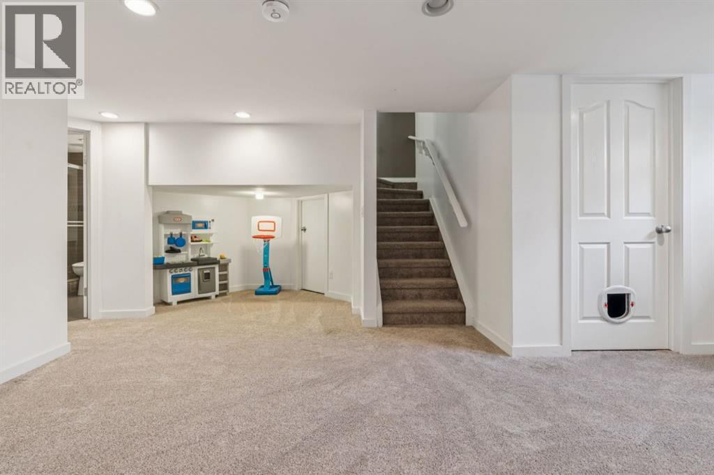 104 Bow Ridge Crescent, Cochrane, Alberta  T4C 1V2 - Photo 22 - A2285566