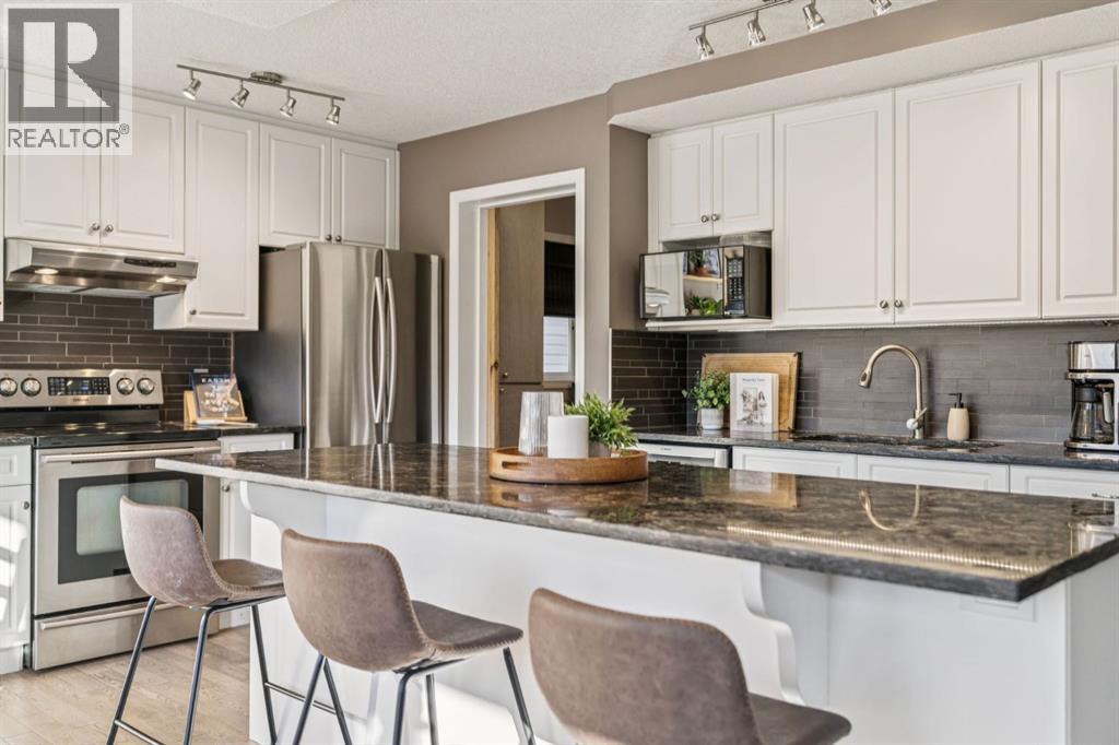 104 Bow Ridge Crescent, Cochrane, Alberta  T4C 1V2 - Photo 9 - A2285566