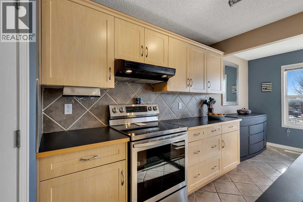 133 Rocky Ridge Heath Nw, Calgary, Alberta  T3G 4Z8 - Photo 12 - A2288834