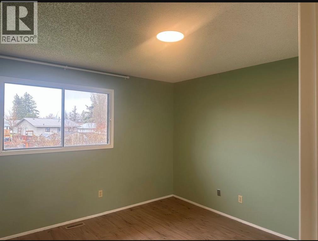 52 Wildrose Crescent, Brooks, Alberta  T1R 0A4 - Photo 7 - A2280679