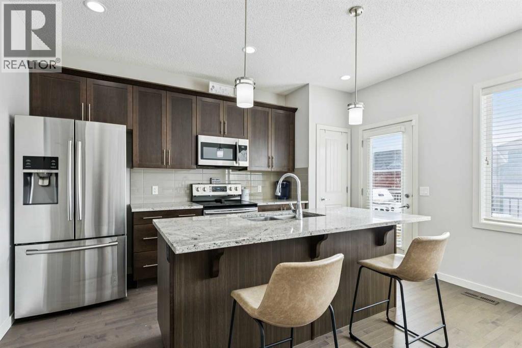 50 Fireside Circle, Cochrane, Alberta  T4C 0Z4 - Photo 10 - A2288908