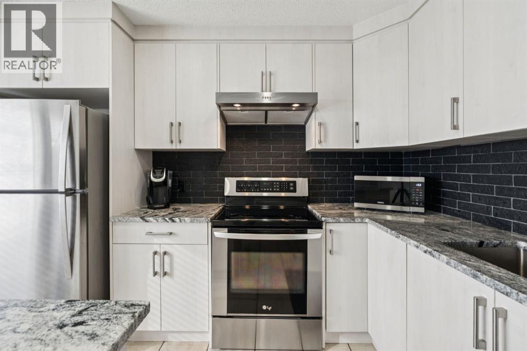 11 Bedford Manor Ne, Calgary, Alberta  T3K 4B8 - Photo 14 - A2288839