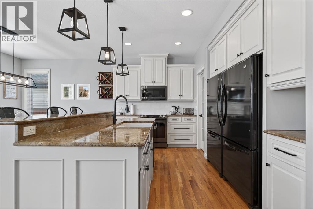 208 Cimarron Drive, Okotoks, Alberta  T1S 0A7 - Photo 14 - A2285179