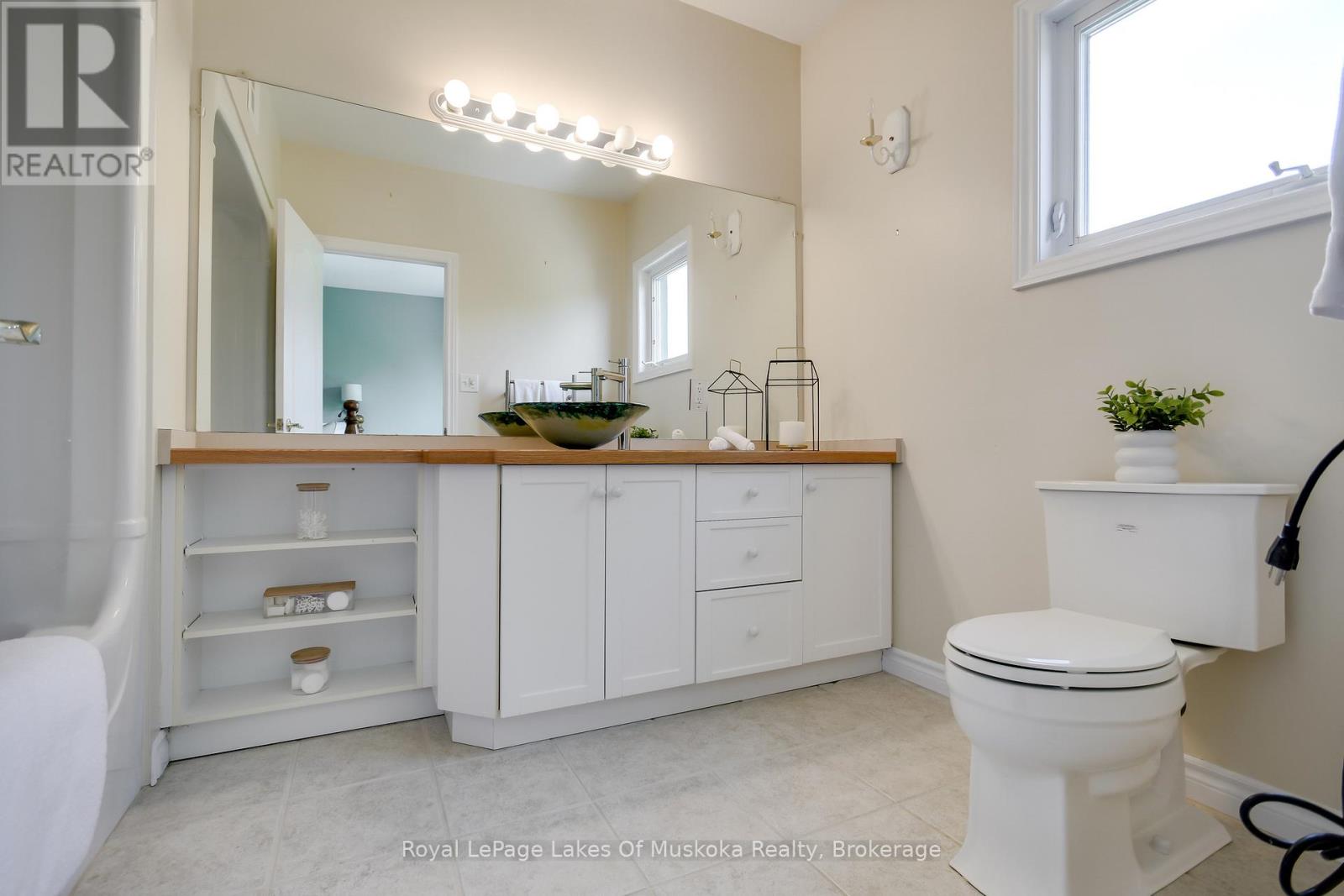 401 - 31 Dairy Lane, Huntsville, Ontario  P1H 1L7 - Photo 14 - X12829668