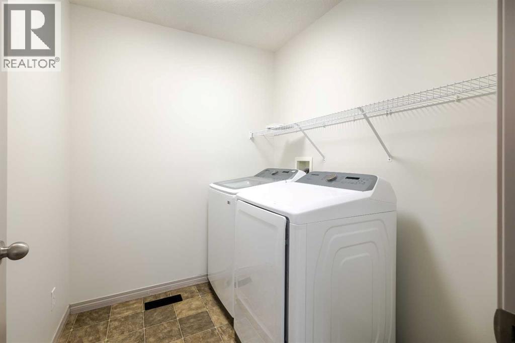 21 Panamount Row Nw, Calgary, Alberta  T3K 0C6 - Photo 28 - A2275676