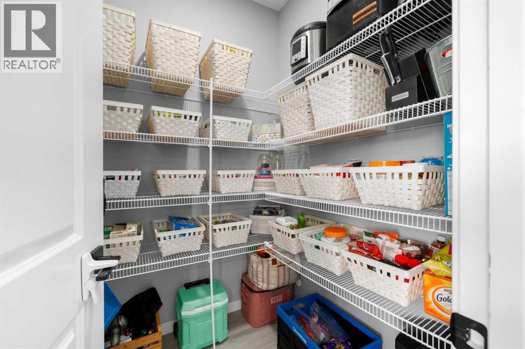 92 Wolf Gate, Okotoks, Alberta  T1S 5T9 - Photo 10 - A2288264