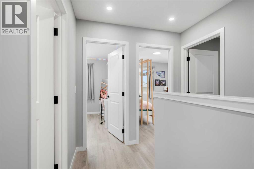 92 Wolf Gate, Okotoks, Alberta  T1S 5T9 - Photo 17 - A2288264