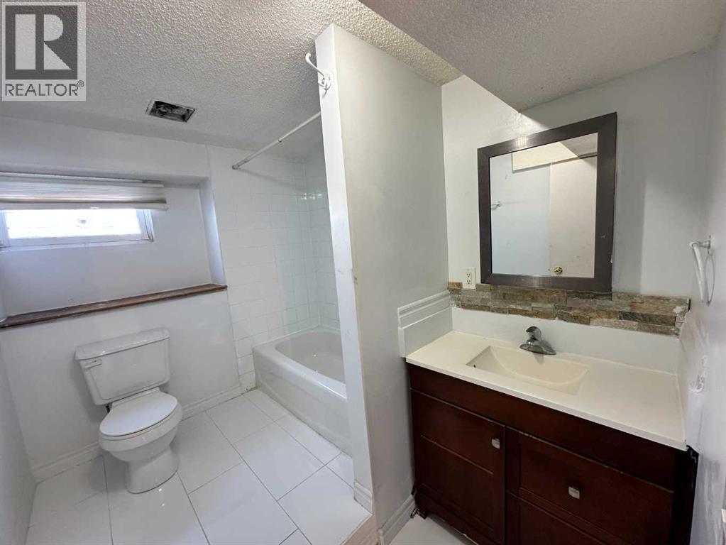 212 78 Avenue Ne, Calgary, Alberta  T2K 0R2 - Photo 4 - A2289672