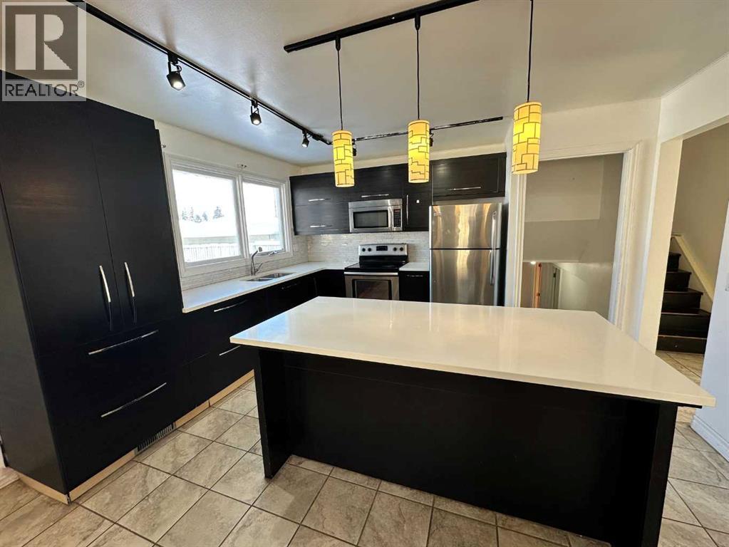 212 78 Avenue Ne, Calgary, Alberta  T2K 0R2 - Photo 7 - A2289672