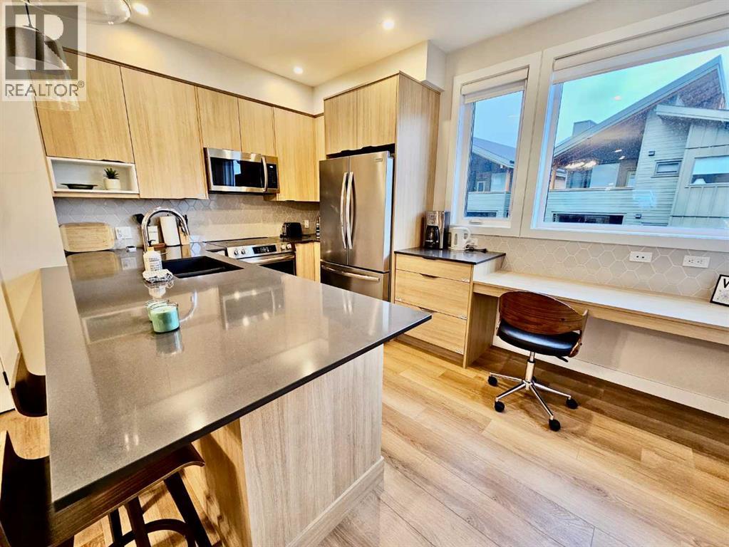 202i, 209 Stewart Creek Rise, Canmore, Alberta  T1W 0G6 - Photo 3 - A2281553
