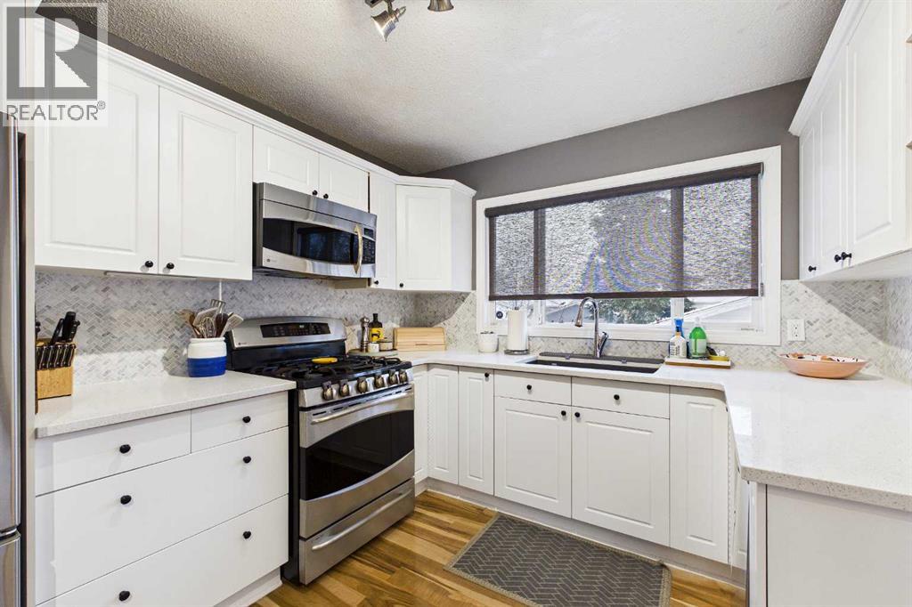 335 Huntridge Road Ne, Calgary, Alberta  T2K 4B8 - Photo 12 - A2288517