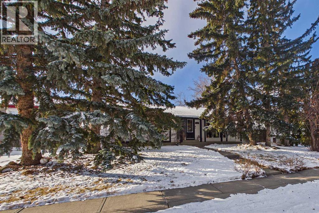 335 Huntridge Road Ne, Calgary, Alberta  T2K 4B8 - Photo 3 - A2288517