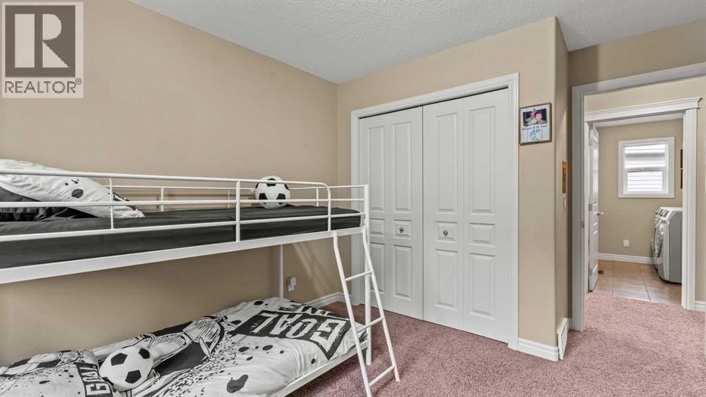 153 Heritage Bay, Cochrane, Alberta  T4C 0L5 - Photo 32 - A2288162