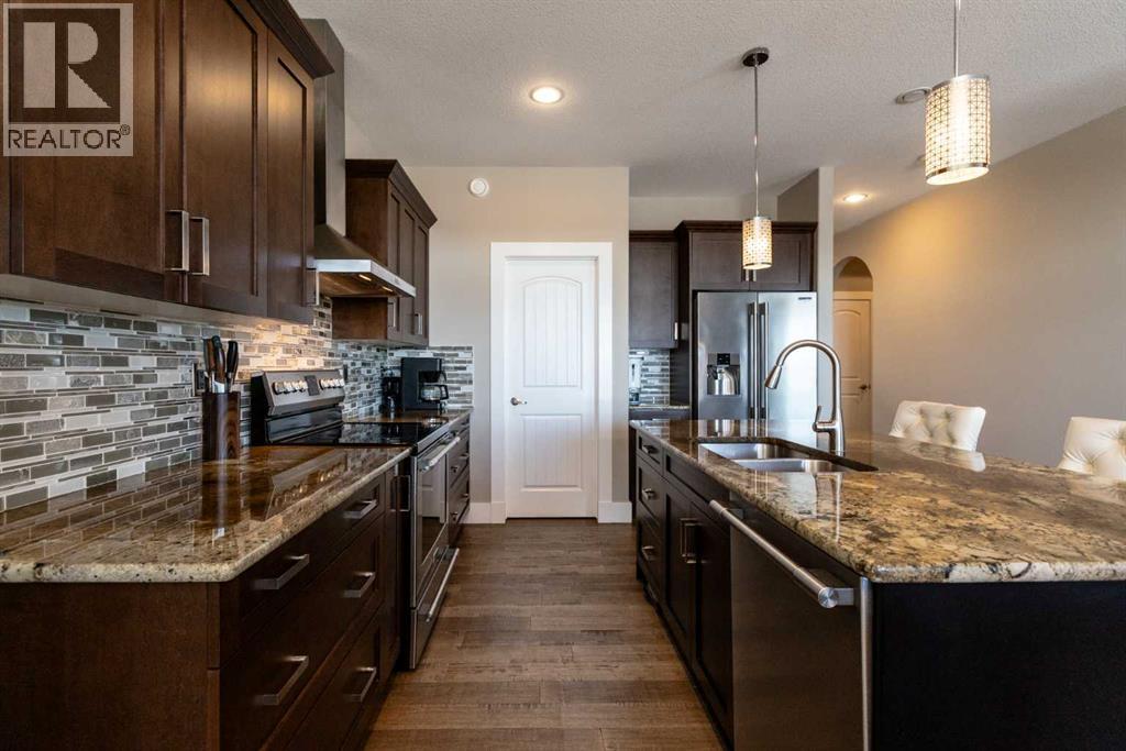 5824 Maple Crescent, Innisfail, Alberta  T4G 0A9 - Photo 8 - A2287177