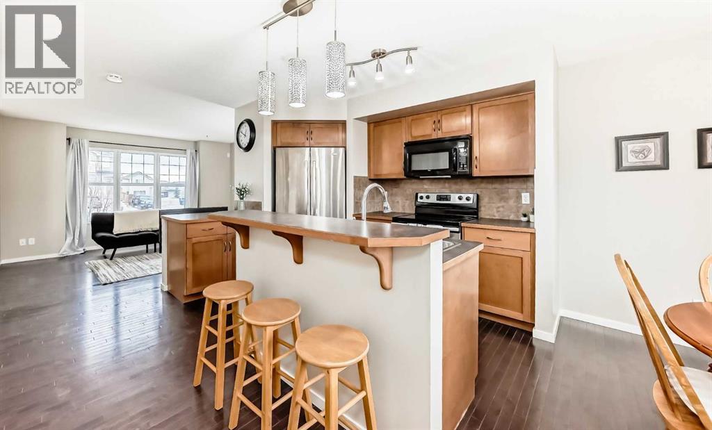 822 Panatella Boulevard Nw, Calgary, Alberta  T3K 0n7 - Photo 7 - A2284706