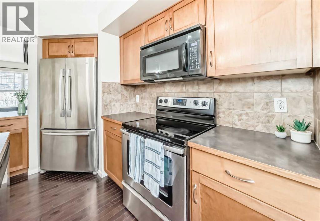 822 Panatella Boulevard Nw, Calgary, Alberta  T3K 0n7 - Photo 8 - A2284706