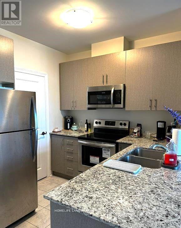 821 - 39 New Delhi Drive, Markham, Ontario  L3S 0E1 - Photo 4 - N12830632