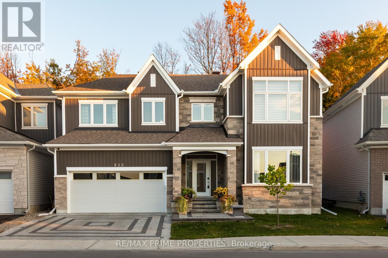 Welcome to 820 Mercier Crescent in the desirable Chapel Hill South community of Ottawa. Backing directly onto peaceful greenspace with no rear neighbors, this home offers rare privacy in a prime family-friendly location. The curb appeal stands out with a fully interlocked driveway featuring built-in accent lighting and professionally finished landscaping in both the front and backyard. The backyard is designed as a private retreat, complete with integrated lighting, custom water features, and a gas line for your BBQ - perfect for entertaining or relaxing evenings outdoors. Inside, Kentwood Cascade brushed white oak hardwood in a striking herringbone pattern flows throughout the main floor, up both staircases, and along the upper hallway. Wrought iron spindles with oak bannisters add warmth and elegance, while pot lights and built-in ceiling speakers enhance the ambiance. The chef's kitchen features melamine VT cabinetry, granite countertops, a rectangular under-mount sink, wall oven, and an impressive six-burner gas stove with chimney-style hood fan, ideal for cooking and hosting. Hardwood continues up the staircase and throughout the upper hallway on the second level, where you'll find four spacious bedrooms. The primary suite backs onto beautiful woods and includes a private ensuite. A well-appointed main bathroom serves the additional bedrooms, and the laundry room includes upgraded cabinetry for added functionality. The fully finished basement provides additional living space with a full bathroom and cozy fireplace, perfect for a media room, games area, or guest retreat. Additional highlights include built-in pantry shelving, custom mudroom storage, a gas dryer, electrical panel surge protector, and a fully insulated garage. A beautifully upgraded home combining privacy, quality finishes, and thoughtful design. (id:48254)