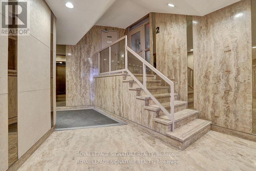 201 - 11 Wincott Drive, Toronto, Ontario  M9R 2R9 - Photo 2 - W12831248