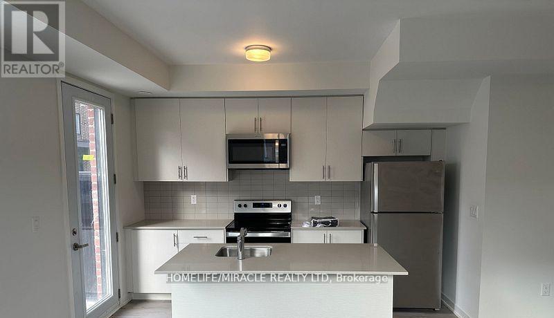 02 - 3415 Ridgeway Drive, Mississauga, Ontario  L5L 0B9 - Photo 5 - W12831508