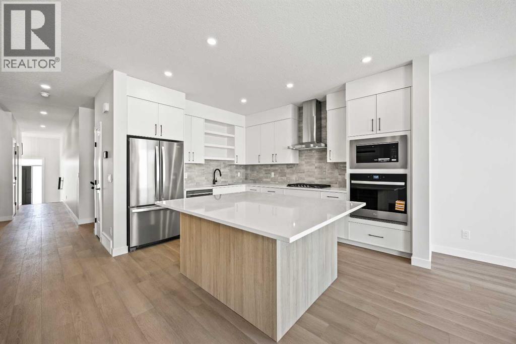 155 Greenwich Drive Nw, Calgary, Alberta  T3B 6N9 - Photo 8 - A2287709