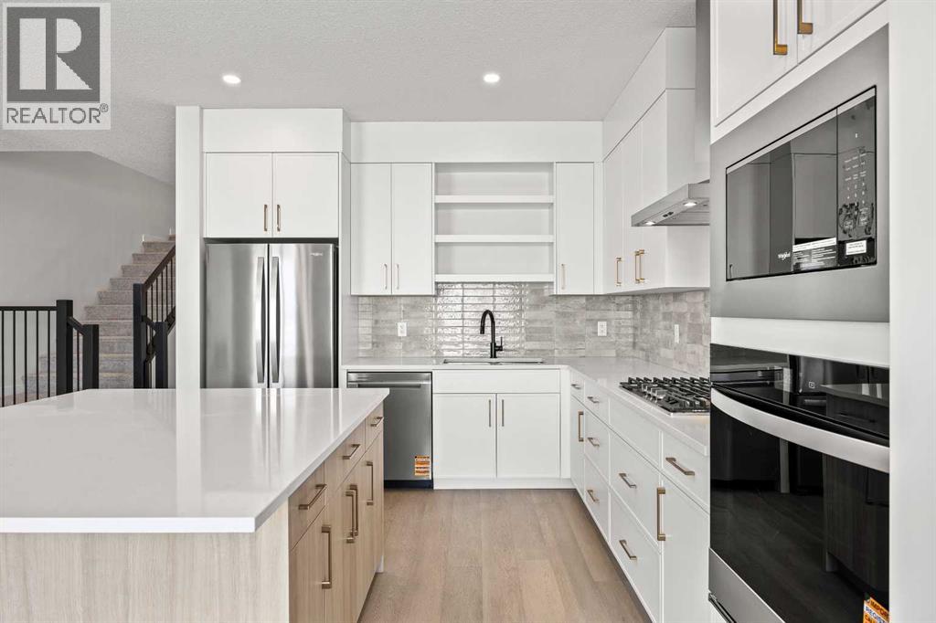 155 Greenwich Drive Nw, Calgary, Alberta  T3B 6N9 - Photo 9 - A2287709