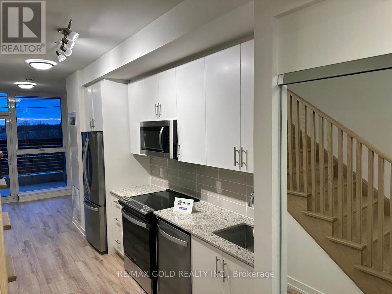 103 - 345 Wheat Boom Drive, Oakville, Ontario  L6H 7X4 - Photo 1 - W12831616