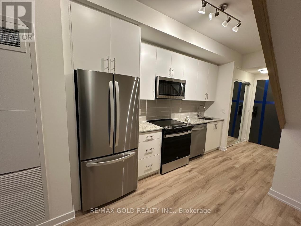 103 - 345 Wheat Boom Drive, Oakville, Ontario  L6H 7X4 - Photo 3 - W12831616