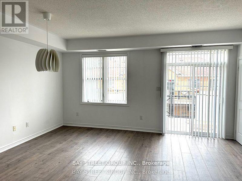 305 - 2333 Sawgrass Drive, Oakville, Ontario  L6H 0L2 - Photo 1 - W12831636