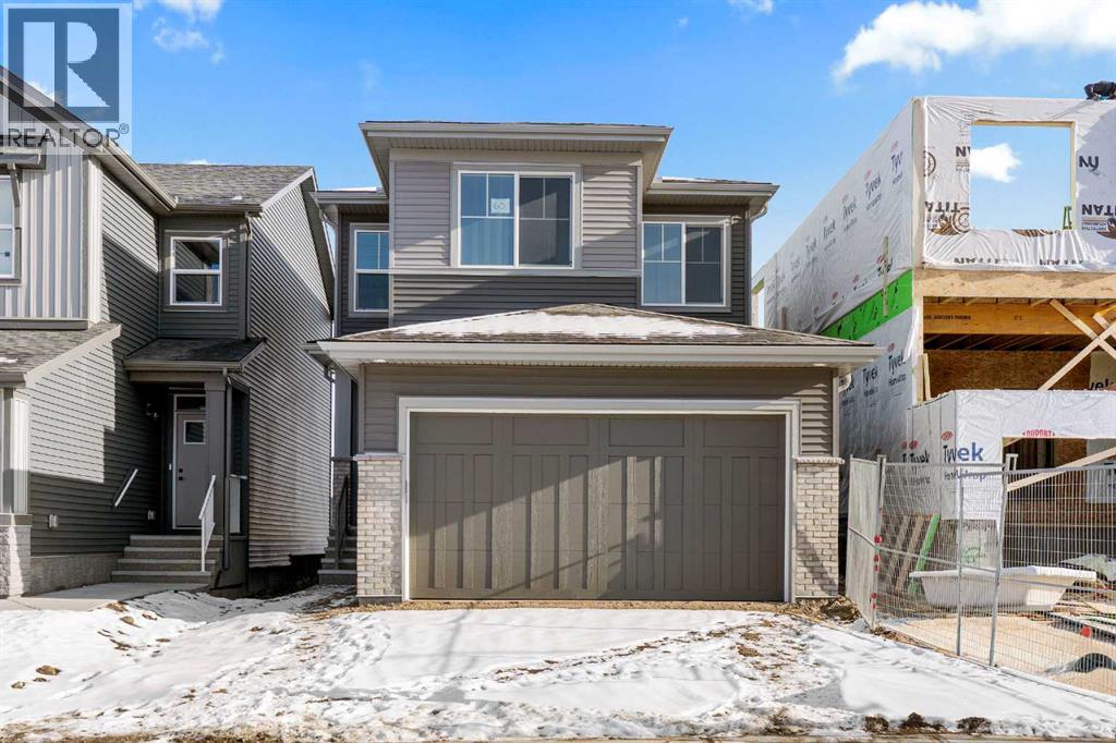 60 Creekstone Grove Sw, Calgary, Alberta  T2x 4X8 - Photo 2 - A2282171