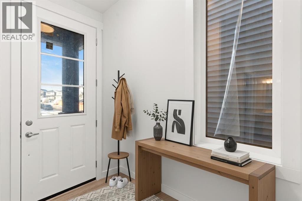 60 Creekstone Grove Sw, Calgary, Alberta  T2x 4X8 - Photo 5 - A2282171