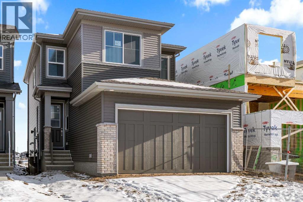 60 Creekstone Grove Sw, Calgary, Alberta  T2x 4X8 - Photo 3 - A2282171