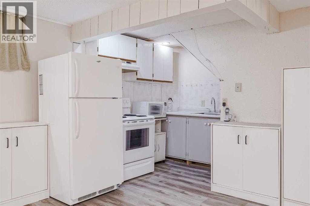 171 Huntchester Crescent Ne, Calgary, Alberta  T2K 5G1 - Photo 4 - A2289361