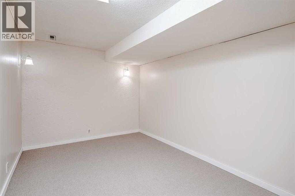 171 Huntchester Crescent Ne, Calgary, Alberta  T2K 5G1 - Photo 6 - A2289361