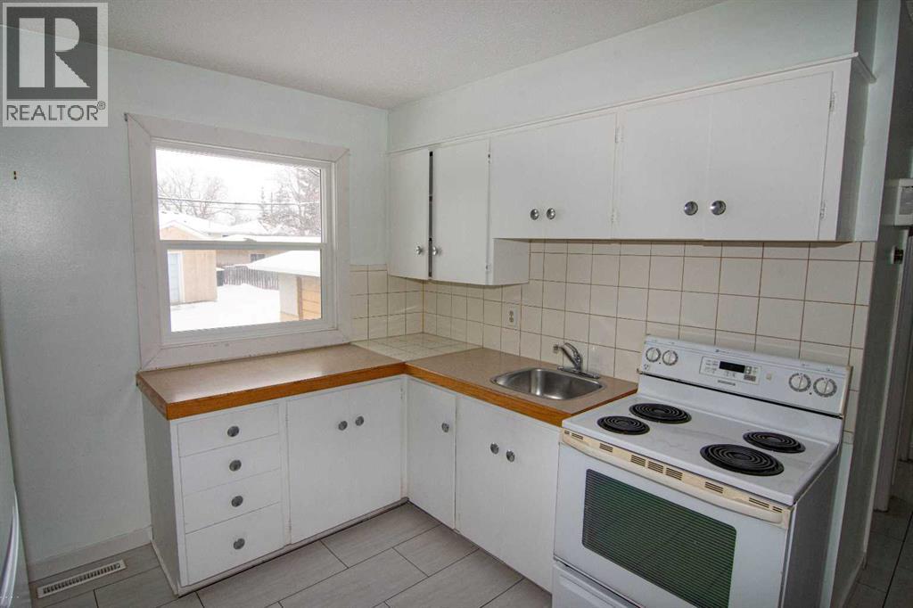 7012 Bowness Road Nw, Calgary, Alberta  T3B 0G4 - Photo 12 - A2289591