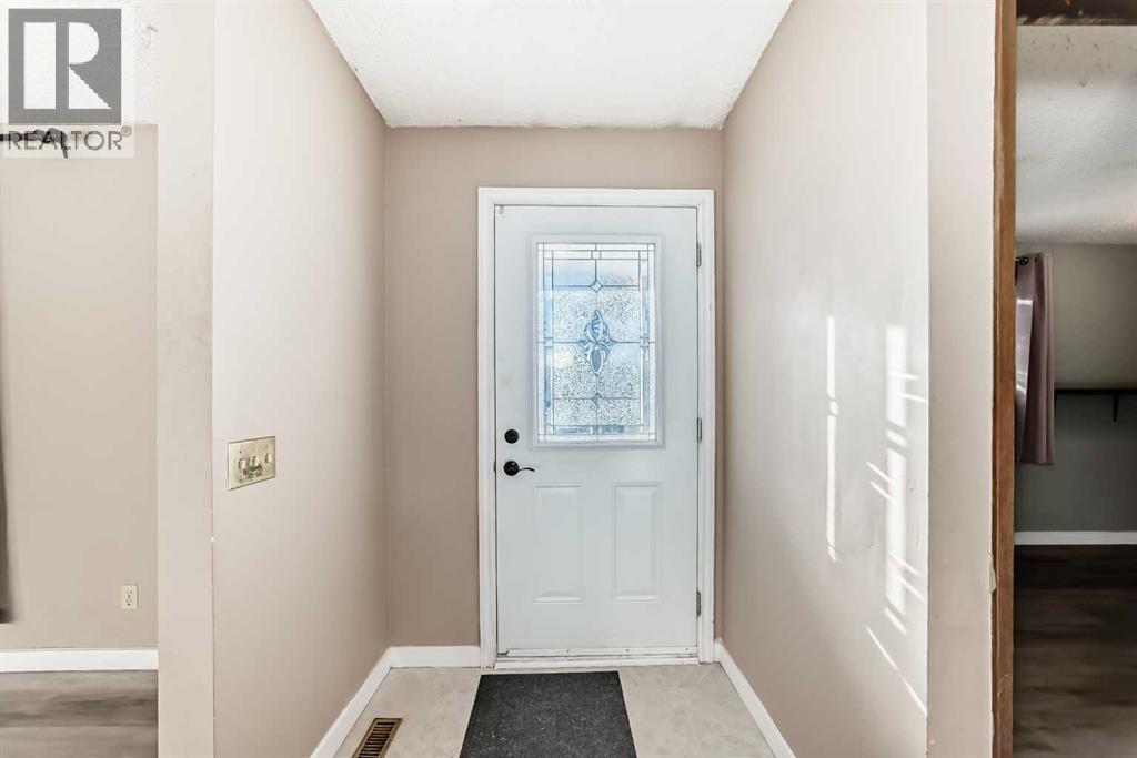 5439 Dalrymple Crescent Nw, Calgary, Alberta  T3A 1R4 - Photo 4 - A2280374